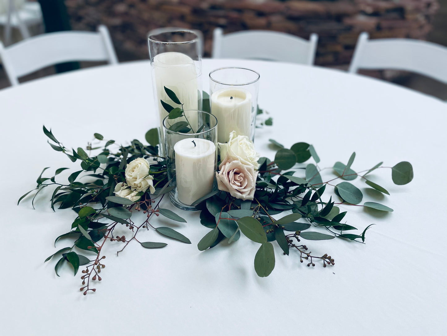 Glass cylinder with pillar candle